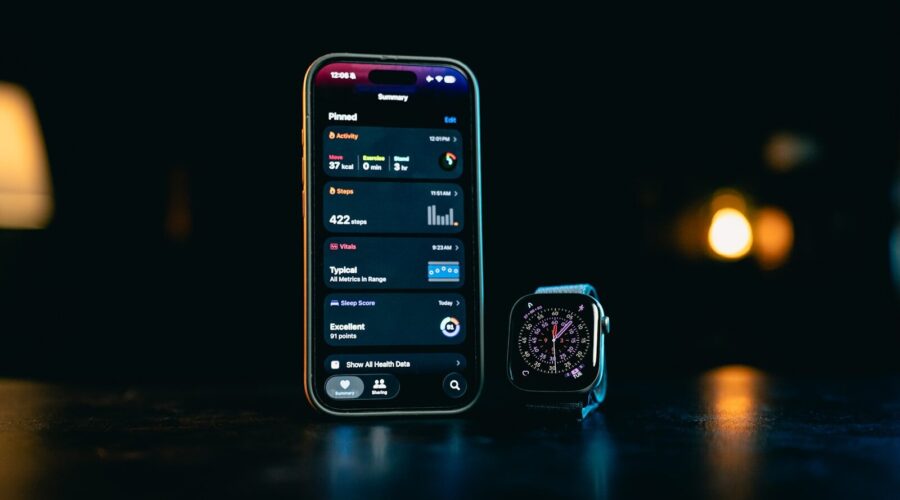Smartphone and smartwatch displaying apps on-screen data